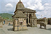 Baijnath Temple - a life sized stone Nandi guard the temple entrance. 